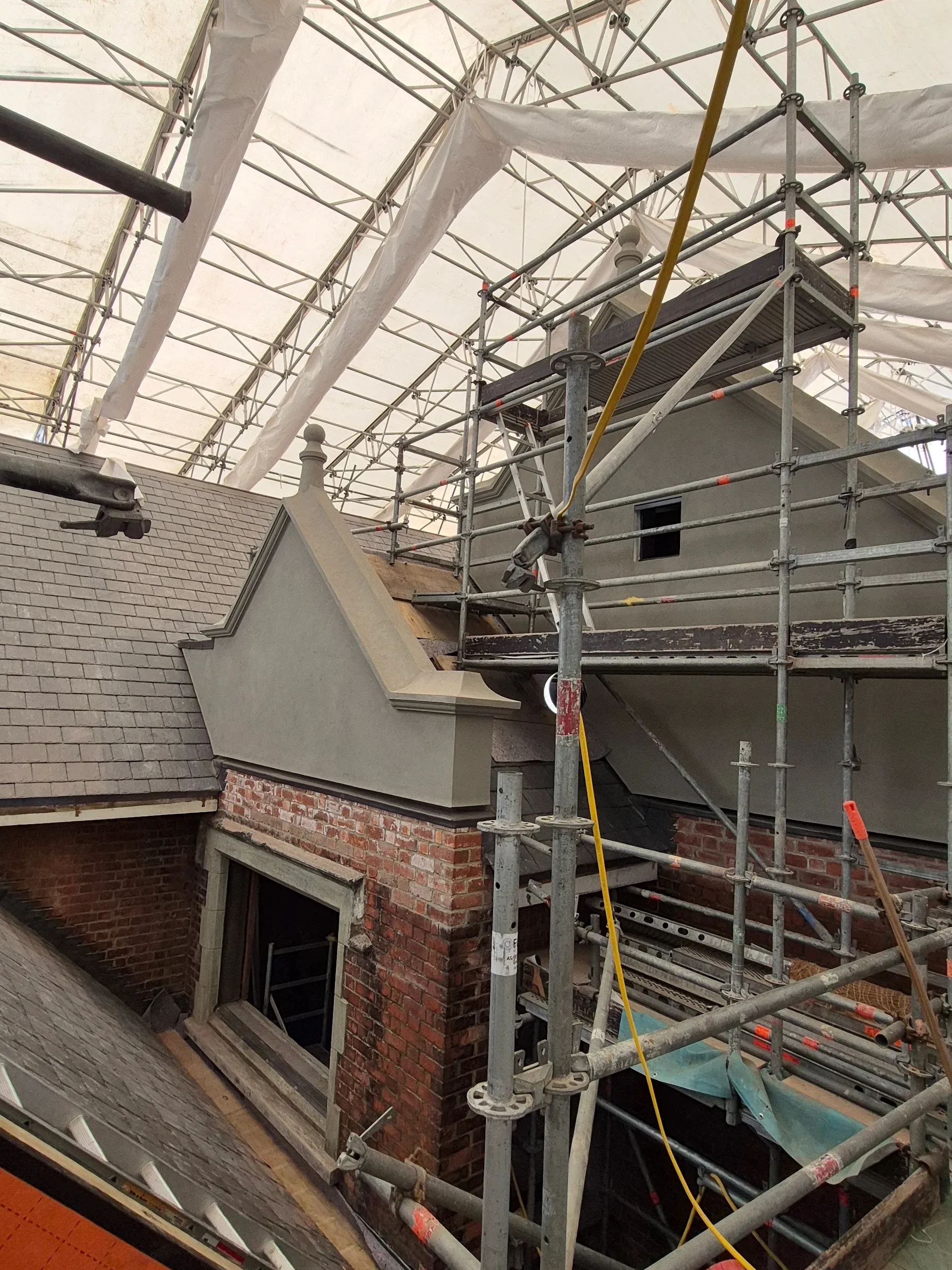 Turnbull House Roof installation under canopy